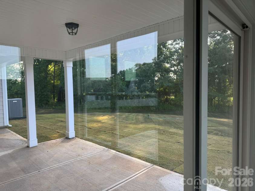 7001 Bil-Mar Drive, Harrisburg, NC 28075.  MLS# CAR4376666, YatesRealty ID 24474. Covered Porch