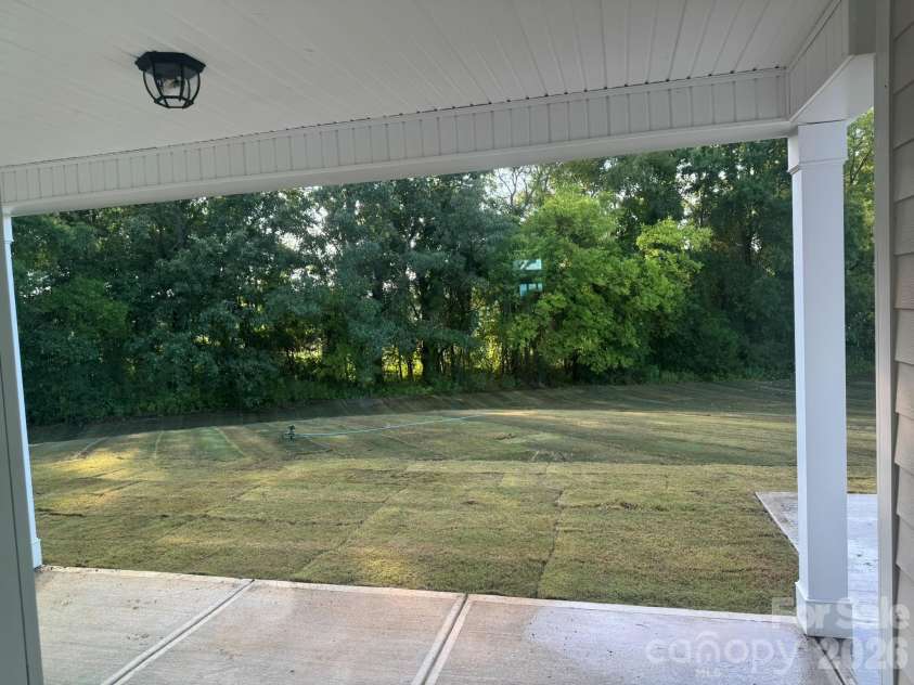7001 Bil-Mar Drive, Harrisburg, NC 28075.  MLS# CAR4376666, YatesRealty ID 24474. Covered Porch