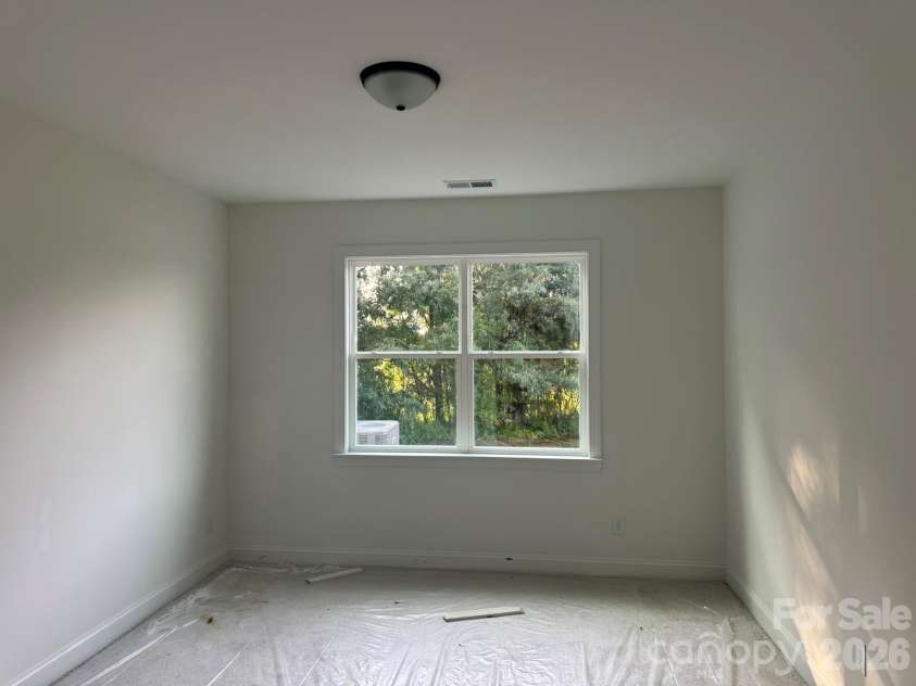 7001 Bil-Mar Drive, Harrisburg, NC 28075.  MLS# CAR4376666, YatesRealty ID 24474. Guest Bedroom