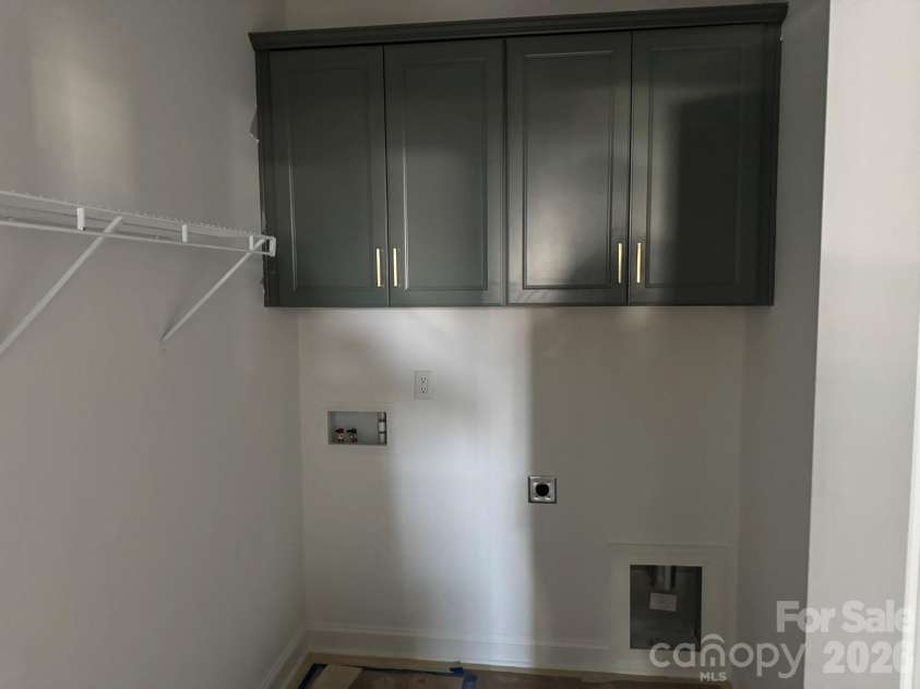 7001 Bil-Mar Drive, Harrisburg, NC 28075.  MLS# CAR4376666, YatesRealty ID 24474. Laundry Room