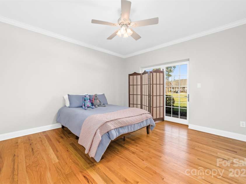 148 Castle Drive, Mooresville, NC 28117.  MLS# CAR4220201, YatesRealty ID 2448. Bedroom 4 with access to it's own patio