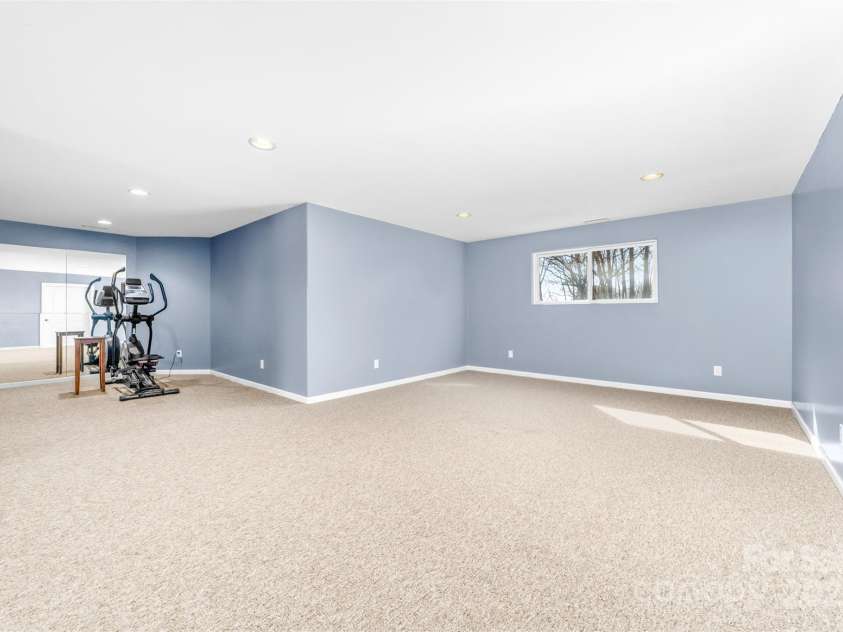 148 Castle Drive, Mooresville, NC 28117.  MLS# CAR4220201, YatesRealty ID 2448. Home gym area