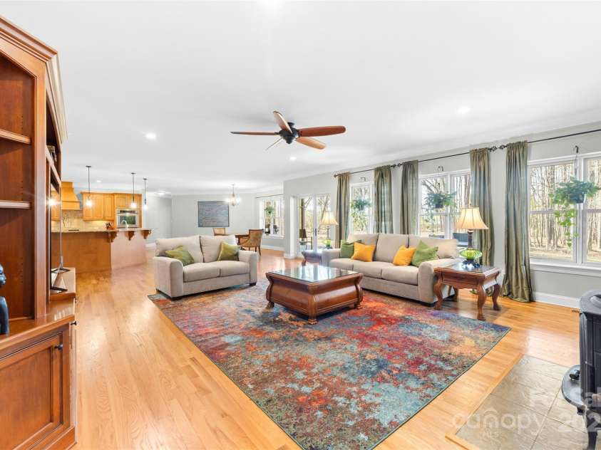 148 Castle Drive, Mooresville, NC 28117.  MLS# CAR4220201, YatesRealty ID 2448. Living room with built in cabnetry