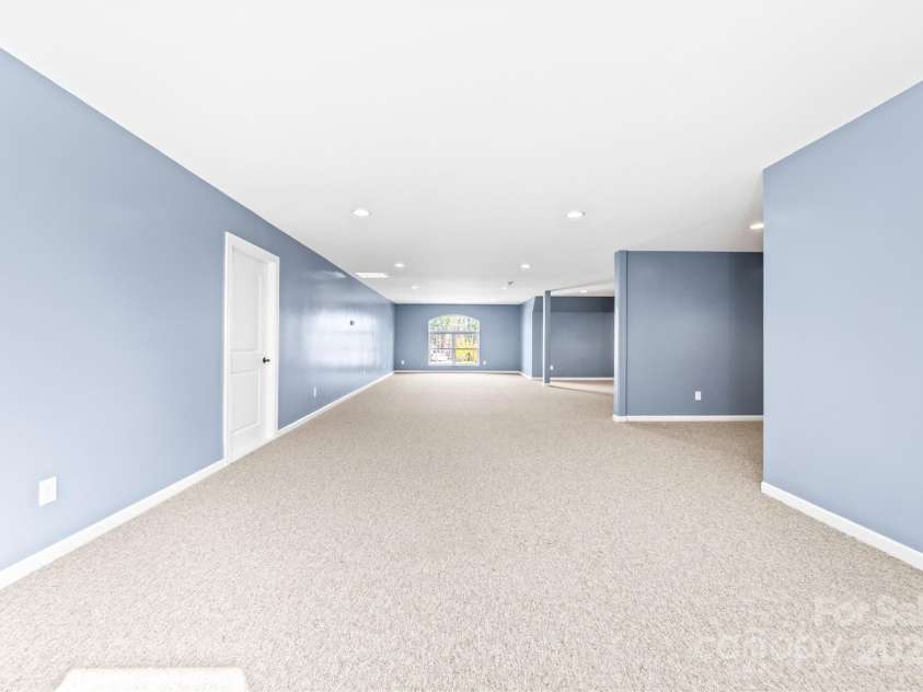 148 Castle Drive, Mooresville, NC 28117.  MLS# CAR4220201, YatesRealty ID 2448. Original design indicated use as a theater