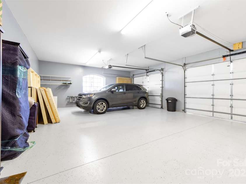 148 Castle Drive, Mooresville, NC 28117.  MLS# CAR4220201, YatesRealty ID 2448. Oversized 2 car garage with epoxy floors