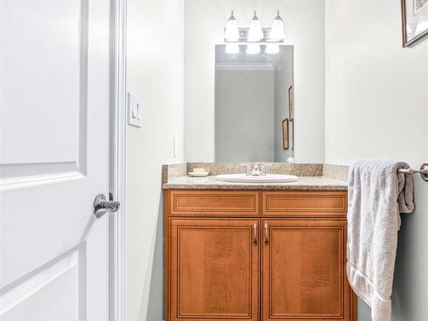 148 Castle Drive, Mooresville, NC 28117.  MLS# CAR4220201, YatesRealty ID 2448. Powder room on main level