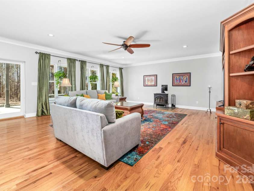 148 Castle Drive, Mooresville, NC 28117.  MLS# CAR4220201, YatesRealty ID 2448. Wood burning stove for added warmth