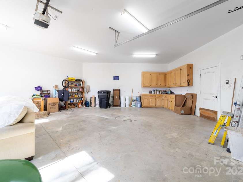 148 Castle Drive, Mooresville, NC 28117.  MLS# CAR4220201, YatesRealty ID 2448. Workhop area in single car garage