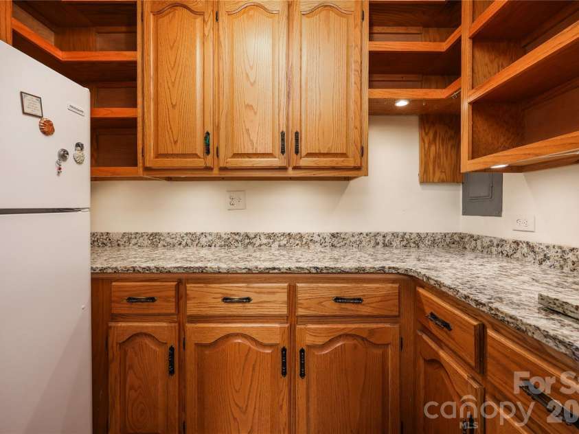 6350 Roscoe Road, Denton, NC 27239.  MLS# CAR4393192, YatesRealty ID 2448. Pantry with granite. Refigerator remains