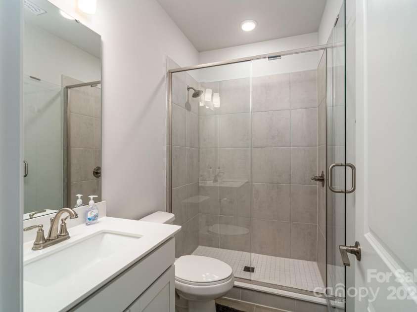 1038 Idyllic Lane, Waxhaw, NC 28173.  MLS# CAR4331673, YatesRealty ID 24480. Front Secondary Full Bathroom