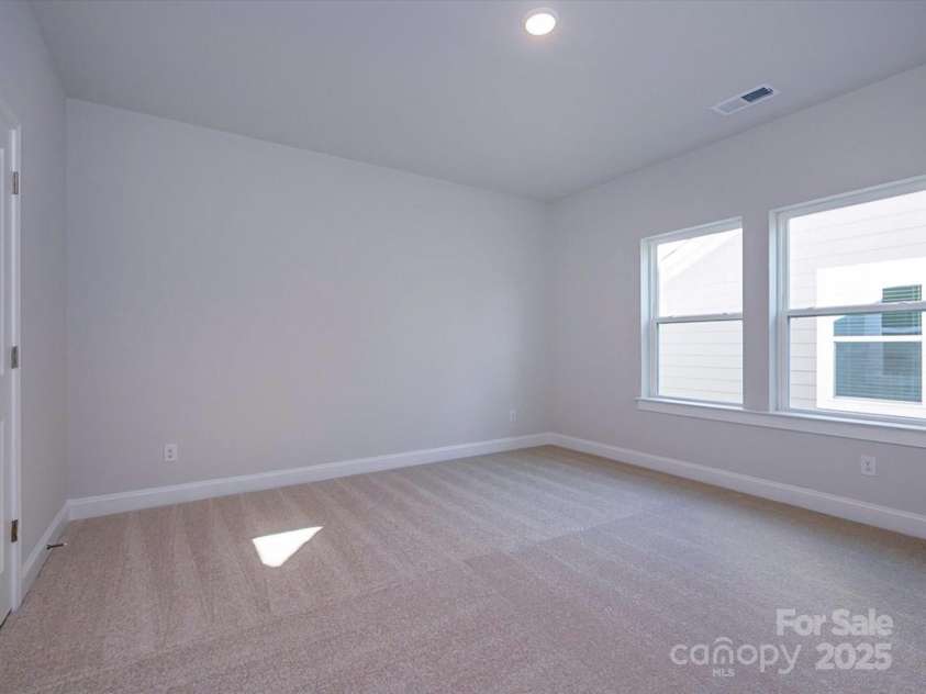 1038 Idyllic Lane, Waxhaw, NC 28173.  MLS# CAR4331673, YatesRealty ID 24480. Upper Level Bedroom
