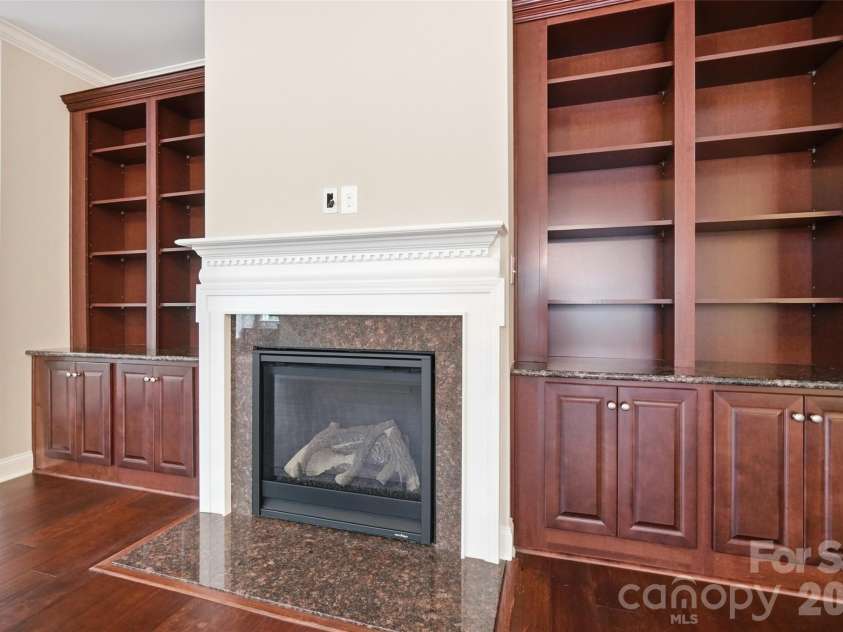 18421 Neville Avenue, Cornelius, NC 28031.  MLS# CAR4413626, YatesRealty ID 24481. Fireplace with built-ins