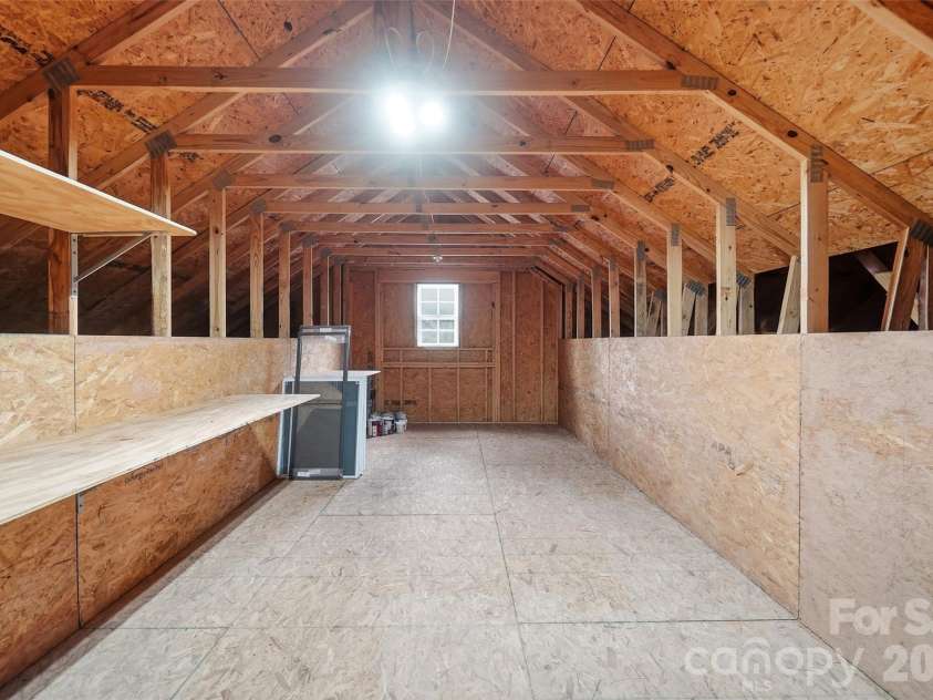 18421 Neville Avenue, Cornelius, NC 28031.  MLS# CAR4413626, YatesRealty ID 24481. Storage over garage
