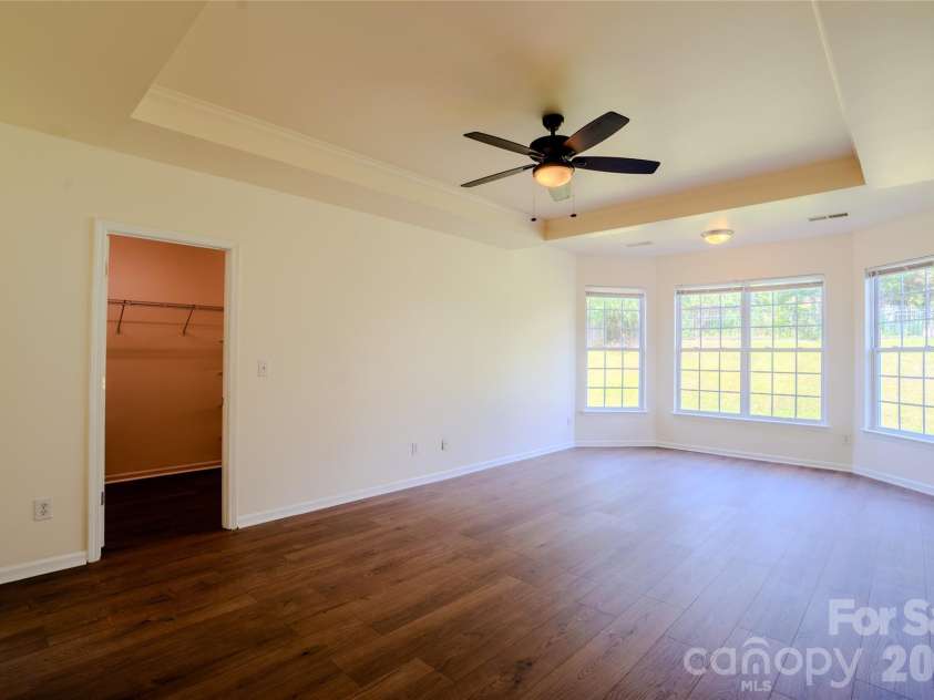 6002 Brook Valley Run, Monroe, NC 28110.  MLS# CAR4353854, YatesRealty ID 24482. Primary bedroom