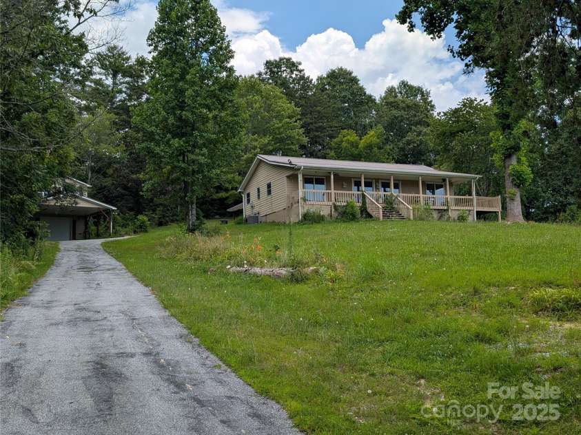 403 Union Hill Road, Hendersonville, NC 28792.  MLS# CAR4278795, YatesRealty ID 24484. Gently sloped driveway.