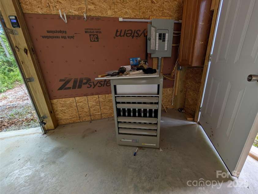 403 Union Hill Road, Hendersonville, NC 28792.  MLS# CAR4278795, YatesRealty ID 24484. Propane Heater stays!