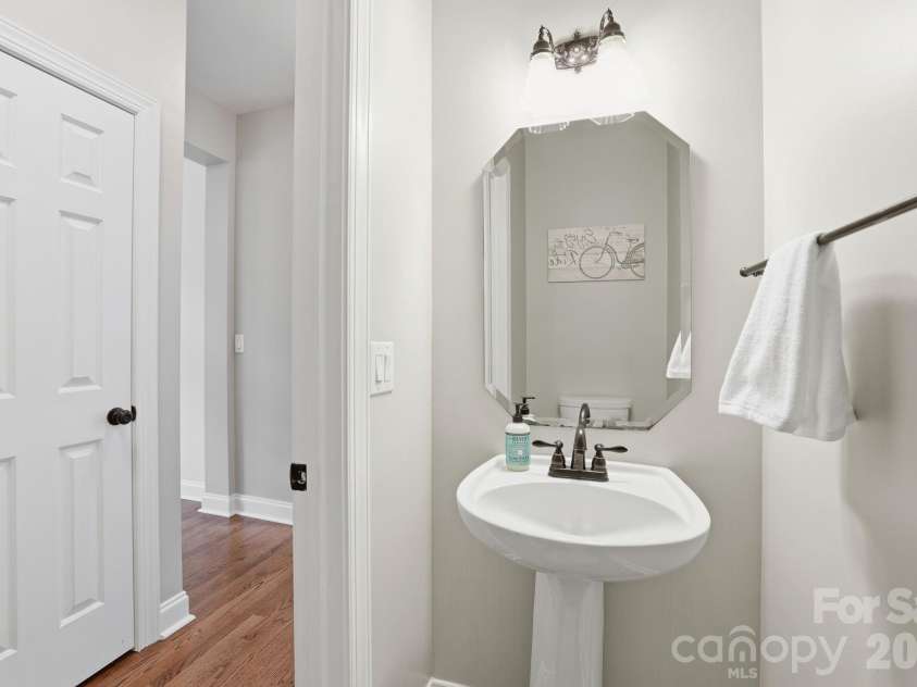 239 Sardis Pointe Road, Matthews, NC 28105.  MLS# CAR4373464, YatesRealty ID 24492. Half bath