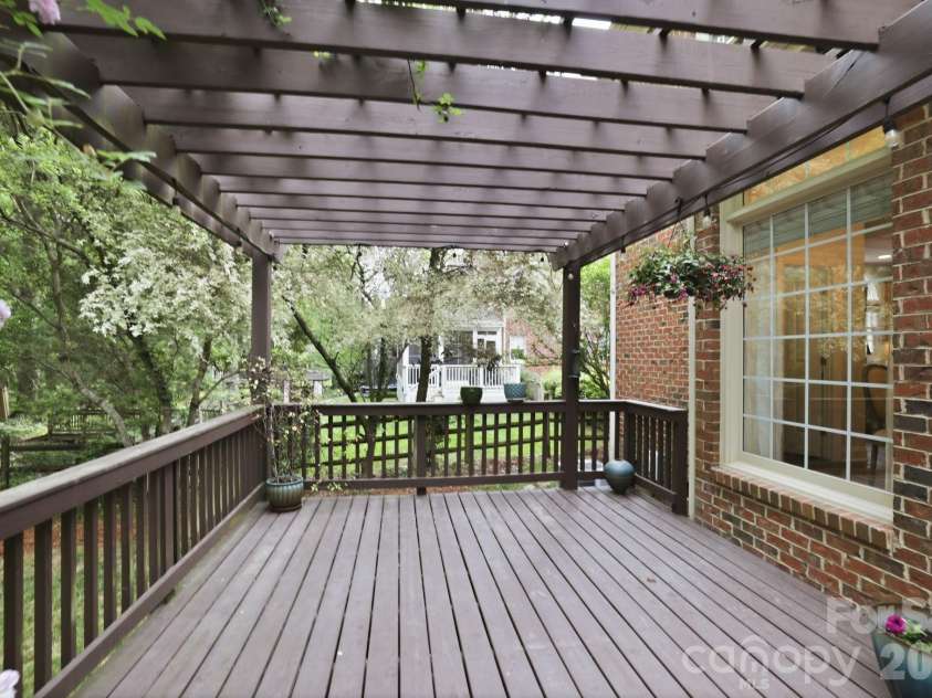 239 Sardis Pointe Road, Matthews, NC 28105.  MLS# CAR4373464, YatesRealty ID 24492. Rear deck