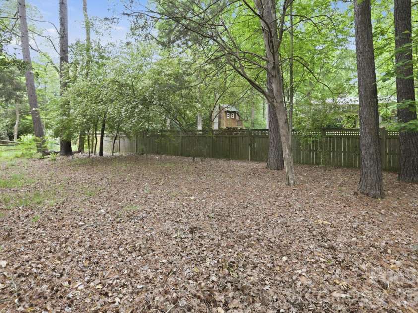239 Sardis Pointe Road, Matthews, NC 28105.  MLS# CAR4373464, YatesRealty ID 24492. Rear extended yard