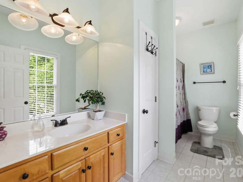 239 Sardis Pointe Road, Matthews, NC 28105.  MLS# CAR4373464, YatesRealty ID 24492. Secondary bath en-suite