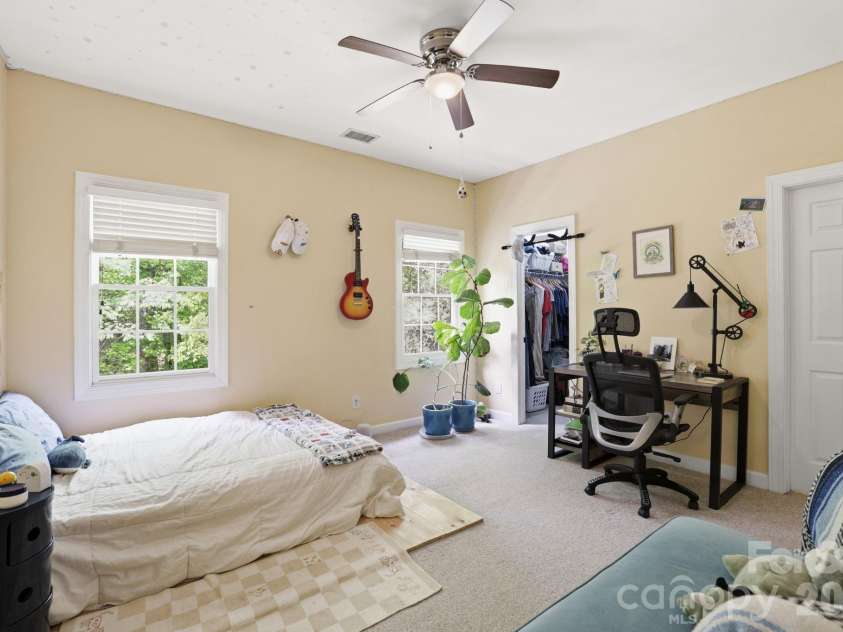 239 Sardis Pointe Road, Matthews, NC 28105.  MLS# CAR4373464, YatesRealty ID 24492. Secondary bedroom