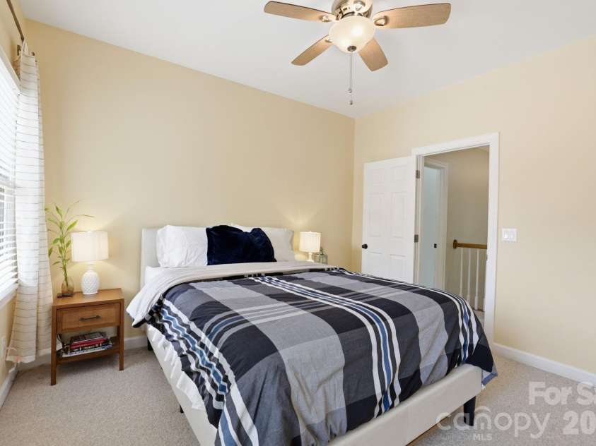 239 Sardis Pointe Road, Matthews, NC 28105.  MLS# CAR4373464, YatesRealty ID 24492. Secondary bedroom