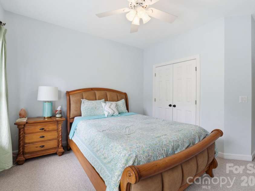 239 Sardis Pointe Road, Matthews, NC 28105.  MLS# CAR4373464, YatesRealty ID 24492. Secondary bedroom with en-suite
