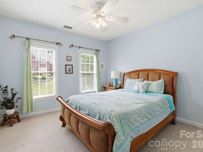 239 Sardis Pointe Road, Matthews, NC 28105.  MLS# CAR4373464, YatesRealty ID 24492. Secondary bedroom withen-suite