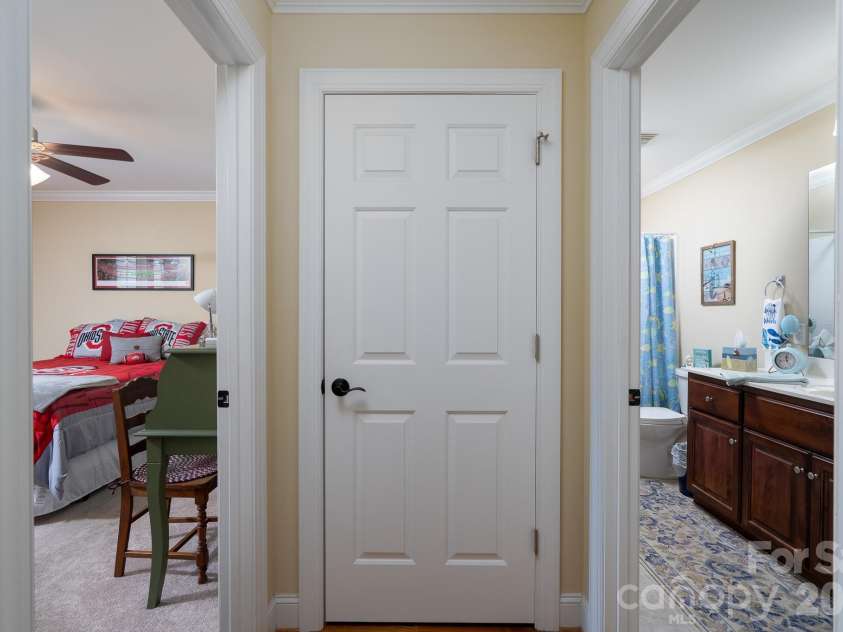 587 Marigold Drive, Kannapolis, NC 28083.  MLS# CAR4383052, YatesRealty ID 24496. Hallway to Secondary Bedroom on Main Level