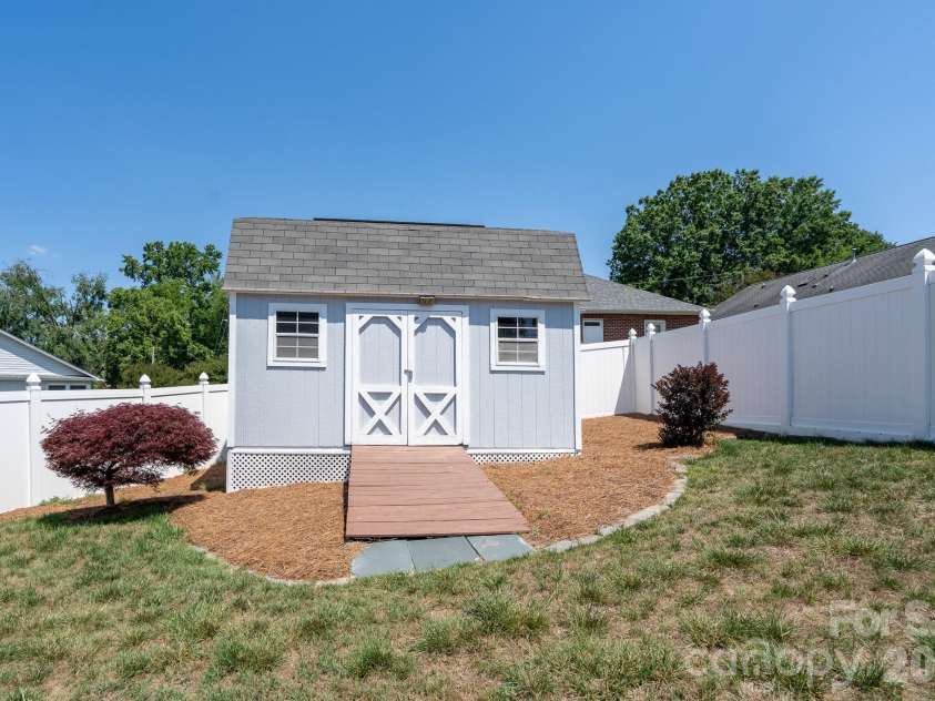 587 Marigold Drive, Kannapolis, NC 28083.  MLS# CAR4383052, YatesRealty ID 24496. Storage Shed