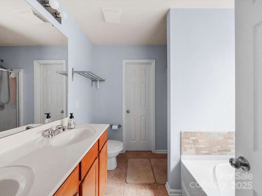 5003 Singletree Lane, Indian Trail, NC 28079.  MLS# CAR4259465, YatesRealty ID 24498. Primary suite bathroom