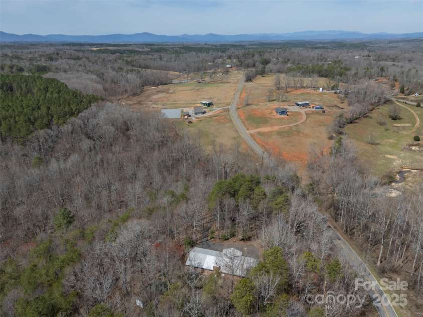 582 County Line Road, Rutherfordton, NC 28139.  MLS# CAR4235377, YatesRealty ID 245. Aerial showing house and road frontage