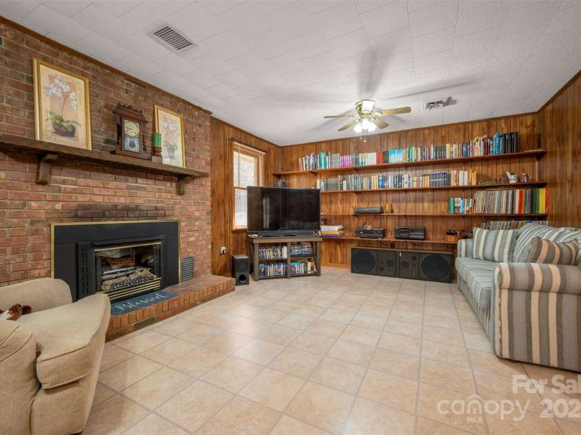 582 County Line Road, Rutherfordton, NC 28139.  MLS# CAR4235377, YatesRealty ID 245. Den has fireplace w/gas logs & built in bookshelves