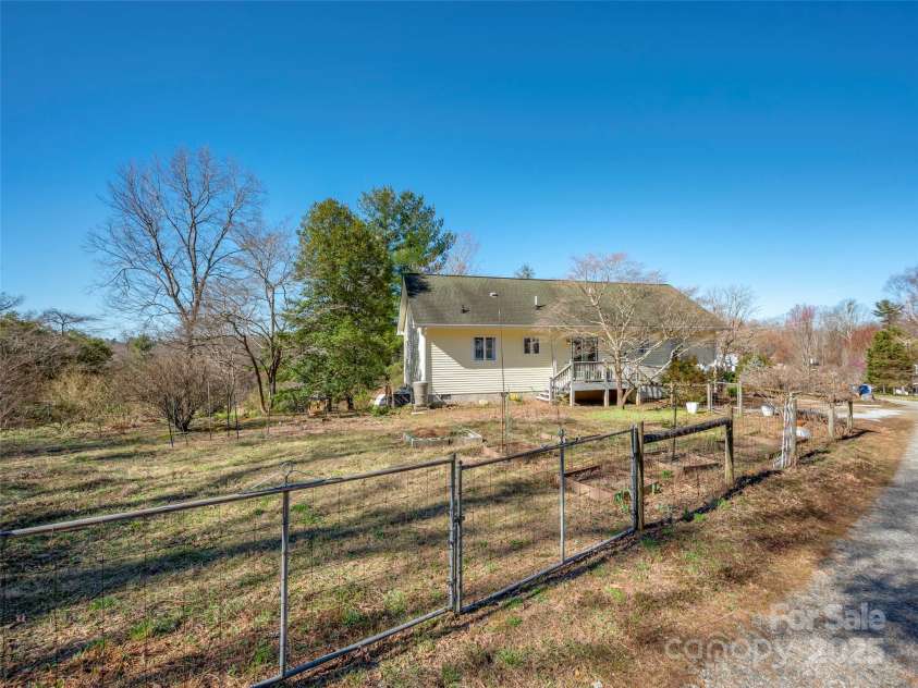 367 Cresent Street, Saluda, NC 28773.  MLS# CAR4235298, YatesRealty ID 2450. Back of property