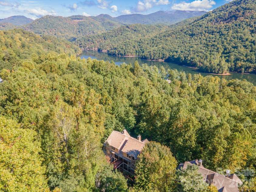 150-2 Saddle Notch Lane, Tuckasegee, NC 28783.  MLS# CAR4181029, YatesRealty ID 24503. Condo building from above. Surrounded by trees