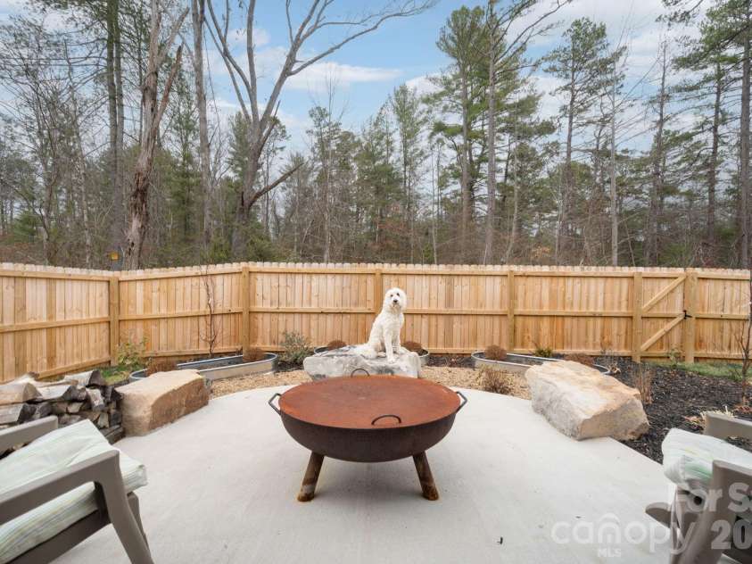 147 Ashelyn Park Drive, Fletcher, NC 28732.  MLS# CAR4357143, YatesRealty ID 24506. Incredible Backyard Oasis with Custom Firepit Area