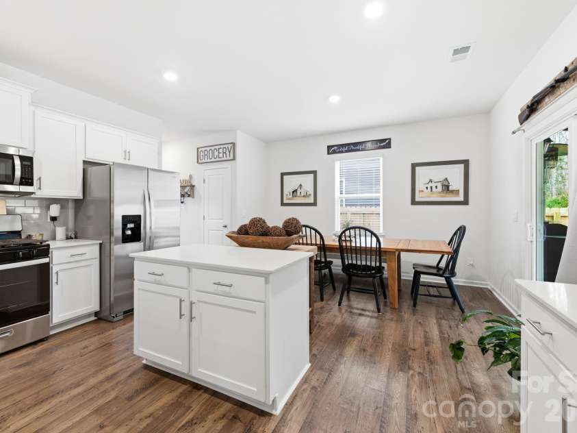 147 Ashelyn Park Drive, Fletcher, NC 28732.  MLS# CAR4357143, YatesRealty ID 24506. Kitchen Island with Easy Access to Breakfast Dining Area
