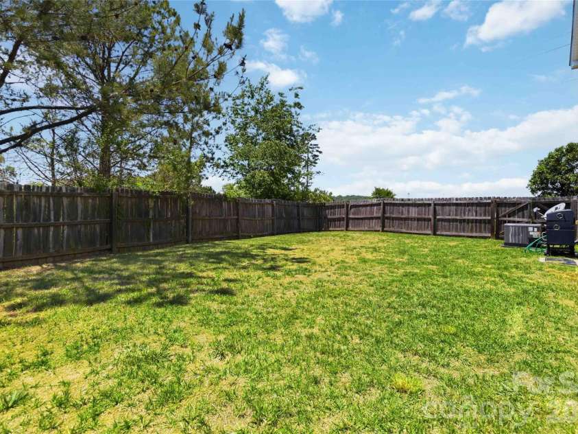1839 Bray Drive, Charlotte, NC 28214.  MLS# CAR4374895, YatesRealty ID 24512. Backyard/fence 