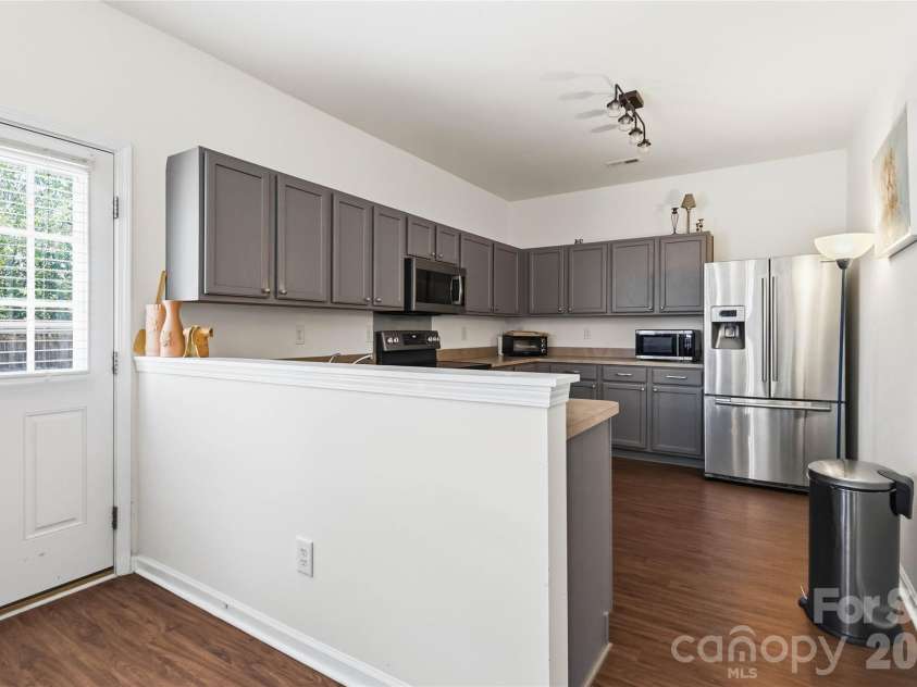 1839 Bray Drive, Charlotte, NC 28214.  MLS# CAR4374895, YatesRealty ID 24512. Kitchen/side