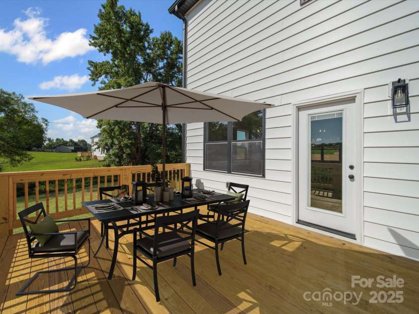 1308 Austin Chaney Road, Wingate, NC 28174.  MLS# CAR4262919, YatesRealty ID 24513. Digitally staged Deck