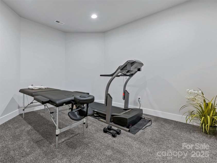 61 Mcintyre Drive, Asheville, NC 28803.  MLS# CAR4275405, YatesRealty ID 24516. Home Gym or Studio
