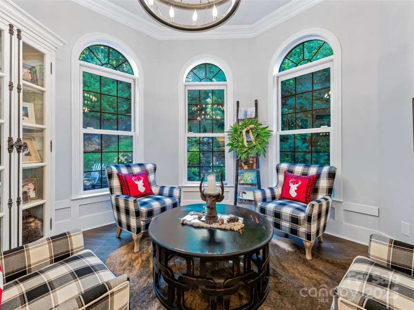 61 Mcintyre Drive, Asheville, NC 28803.  MLS# CAR4275405, YatesRealty ID 24516. Sitting Room Bay with Triple Arched Windows