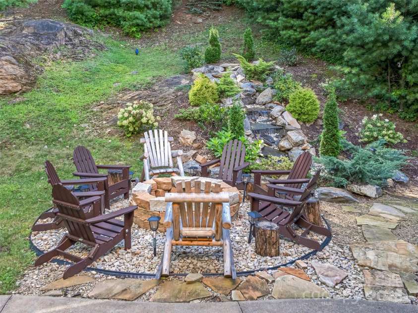 61 Mcintyre Drive, Asheville, NC 28803.  MLS# CAR4275405, YatesRealty ID 24516. Stone Fire Pit
