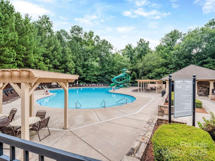 3511 Dominion Green Drive, Charlotte, NC 28269.  MLS# CAR4272819, YatesRealty ID 24518. Community pool