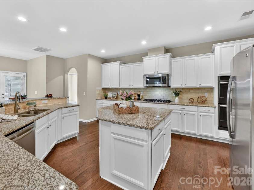 3504 Ringtail Drive, Waxhaw, NC 28173.  MLS# CAR4359232, YatesRealty ID 24519. Center Island ideal area for Prep and Serving! New Microwave is Vented Outside. Double Convection Ovens!