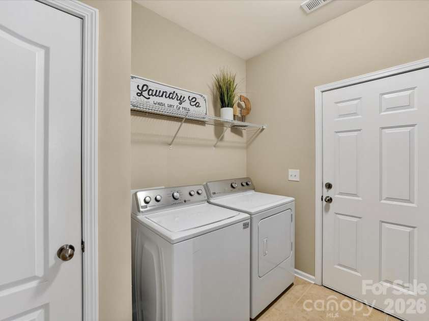 3504 Ringtail Drive, Waxhaw, NC 28173.  MLS# CAR4359232, YatesRealty ID 24519. Main Level Laundry Room w/Tiled Flooring and Separate Closet. Washer and Dryer can remain.