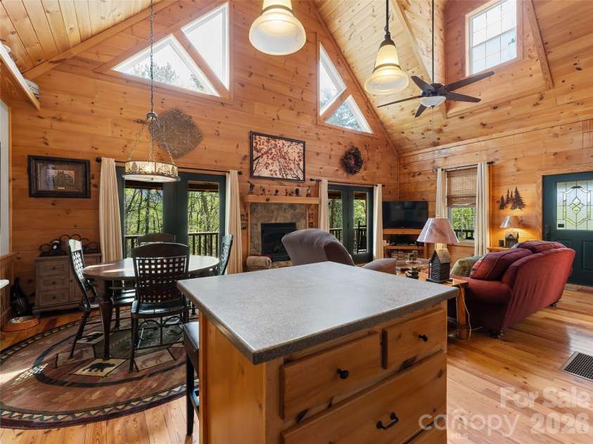 462 Deep Woods Lane, Saluda, NC 28773.  MLS# CAR4366925, YatesRealty ID 24522. Kitchen island with cabinets and drawers
