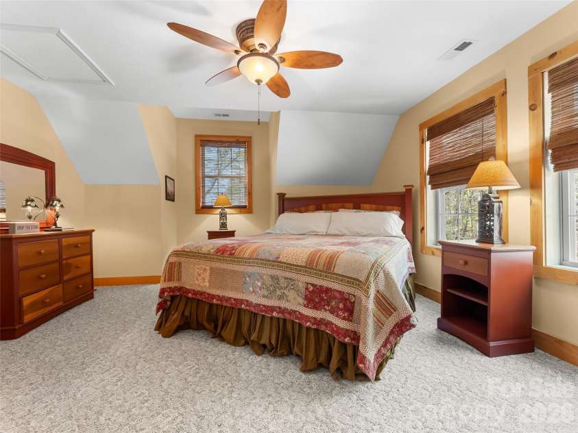 462 Deep Woods Lane, Saluda, NC 28773.  MLS# CAR4366925, YatesRealty ID 24522. Loft primary suite