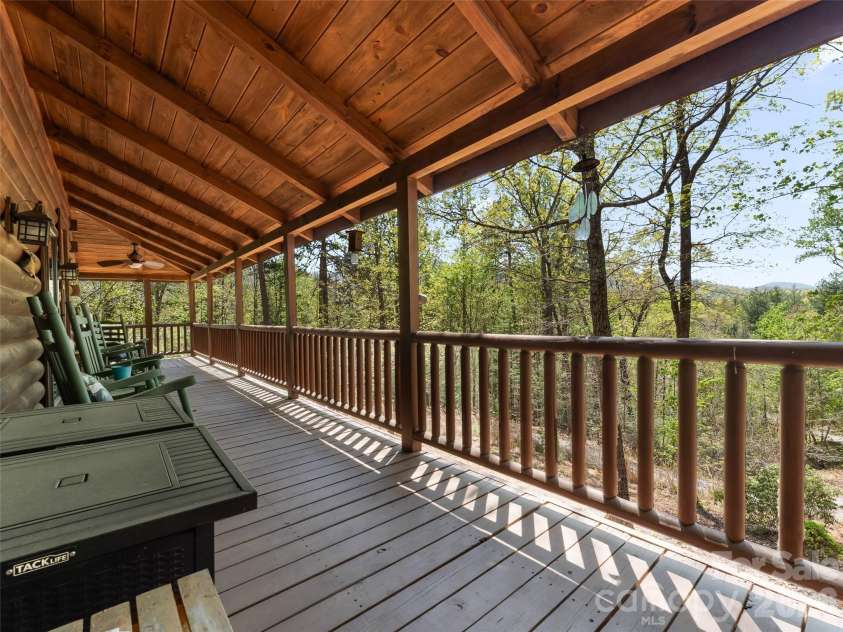 462 Deep Woods Lane, Saluda, NC 28773.  MLS# CAR4366925, YatesRealty ID 24522. Views from the wrap around porch.