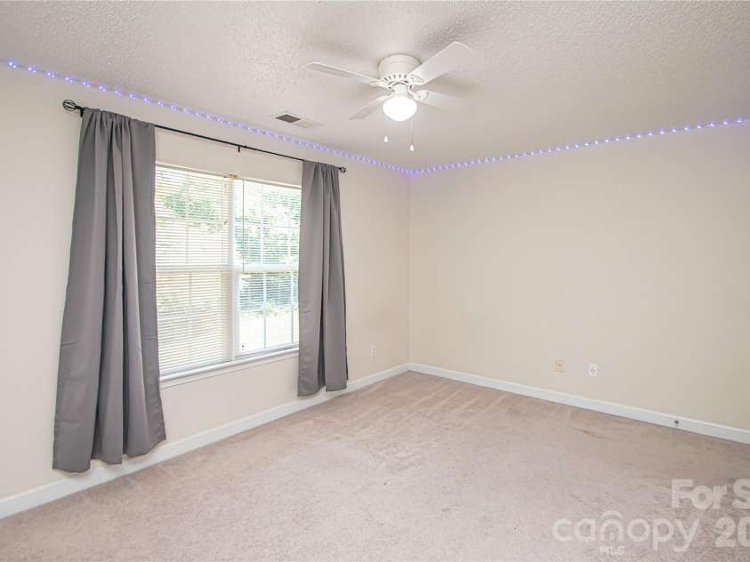 4708 Titus Court, Monroe, NC 28110.  MLS# CAR4371611, YatesRealty ID 24524. Bedroom Two overlook backyard!